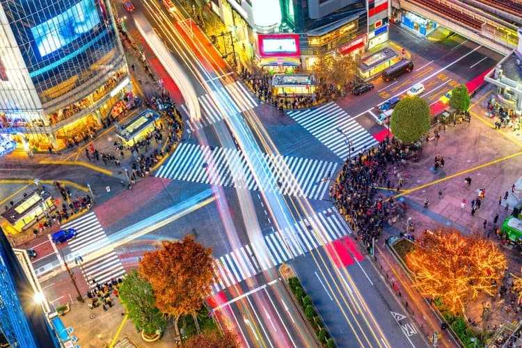 A town crossroads image with neon lights